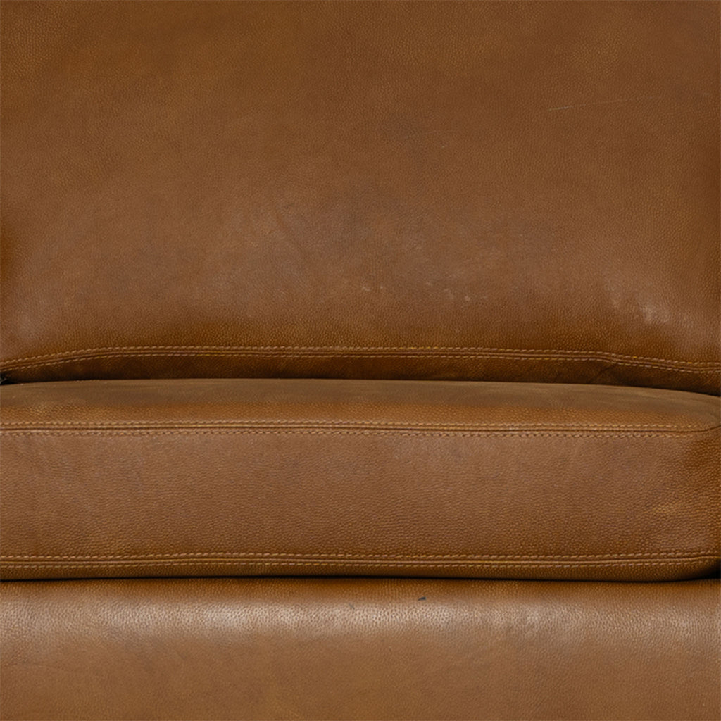 Close-up of a brown leather sofa