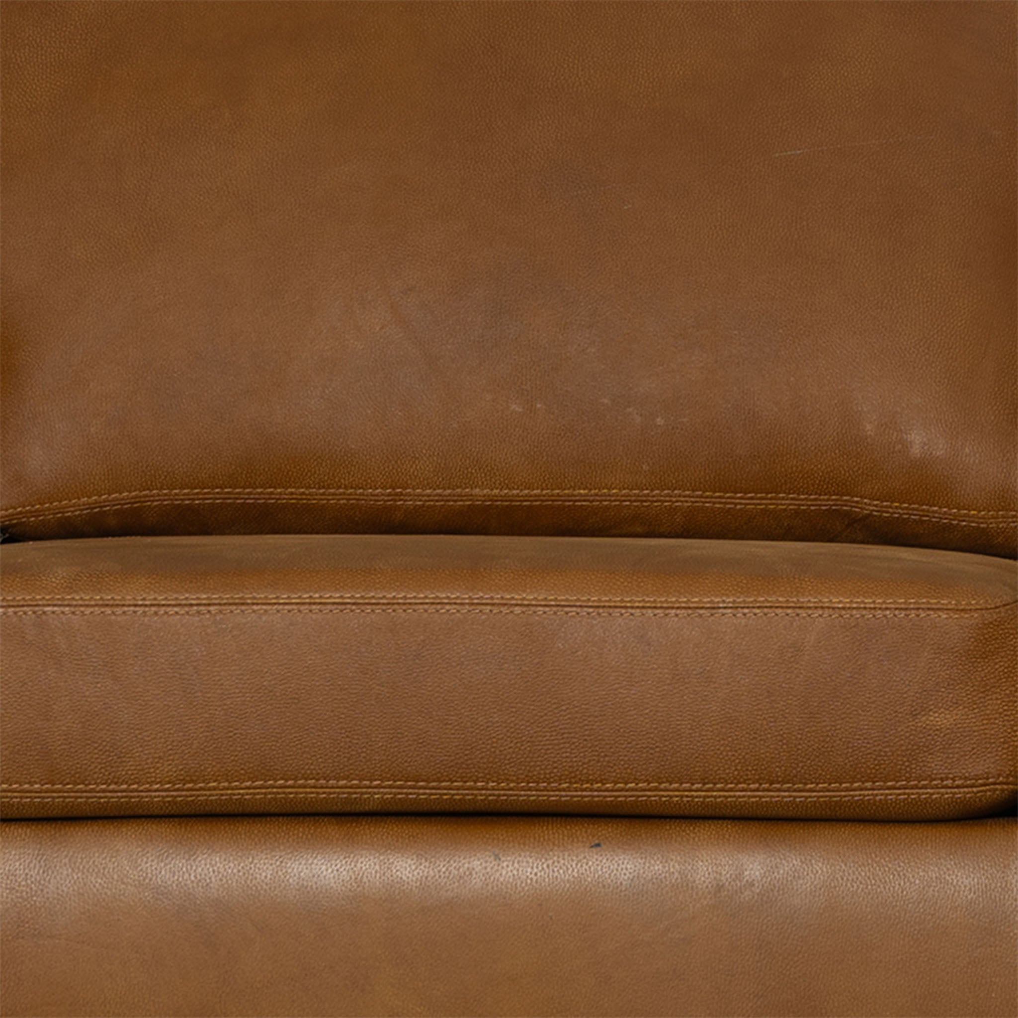 Close-up of a brown leather sofa