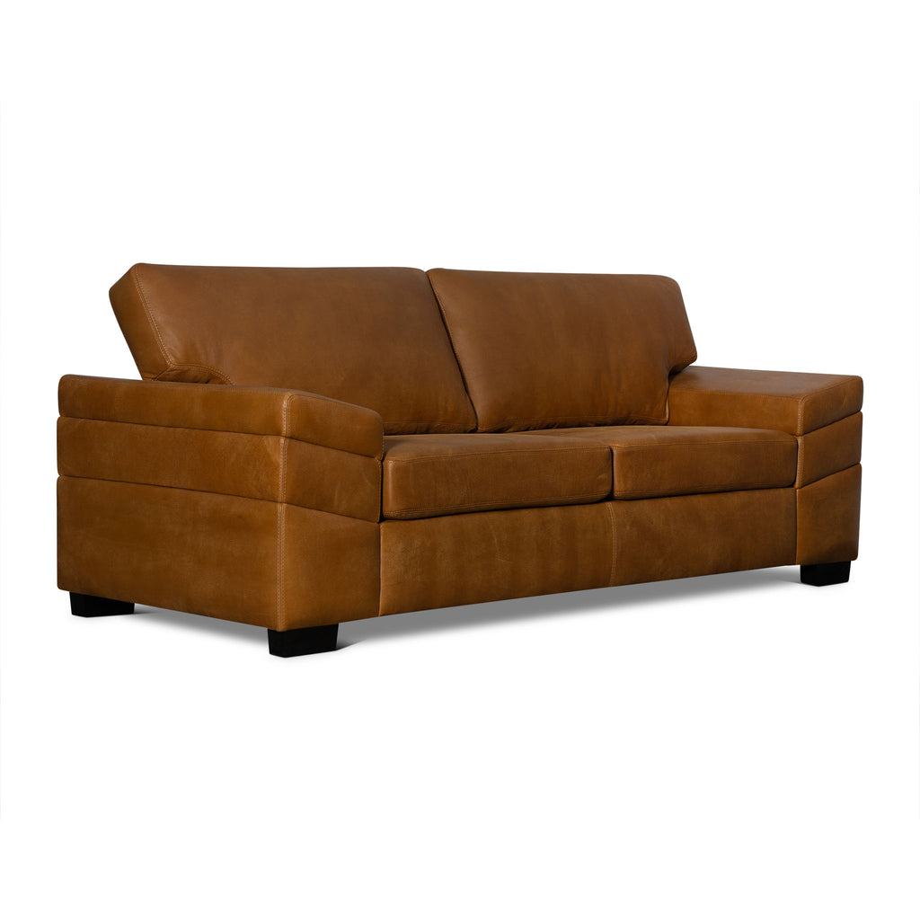 Brown leather sofa on a white background
