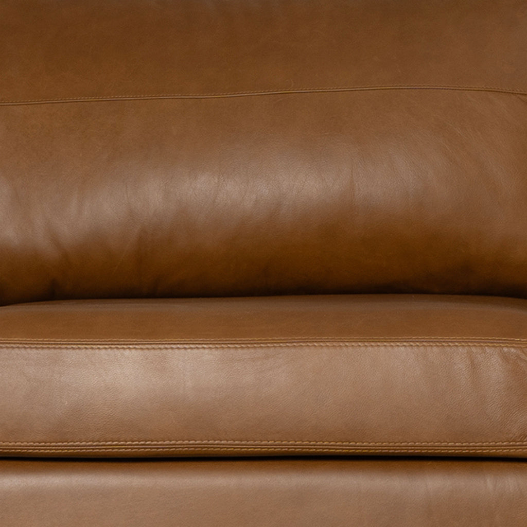 Close-up of a brown leather sofa