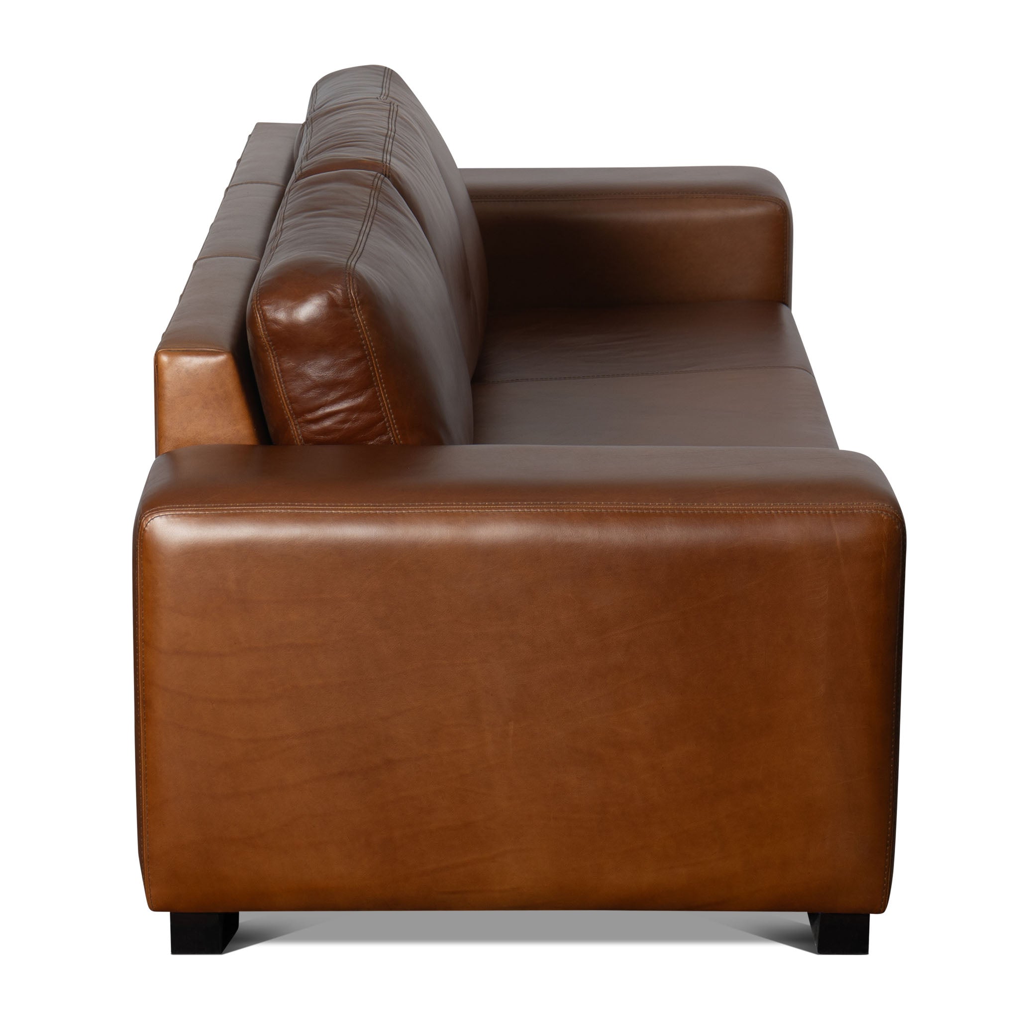 Brown leather sofa on a white background