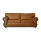 Brown leather sofa on a white background