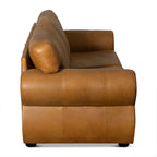Brown leather sofa on a white background